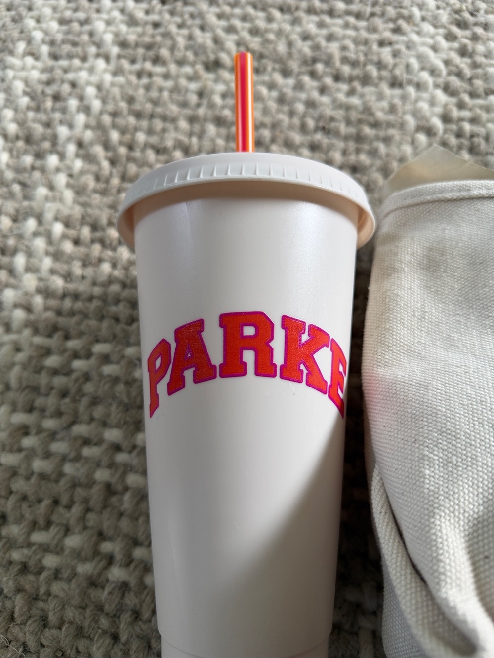 Parker White Tumbler with Pink Logo and Orange-Red Straw
